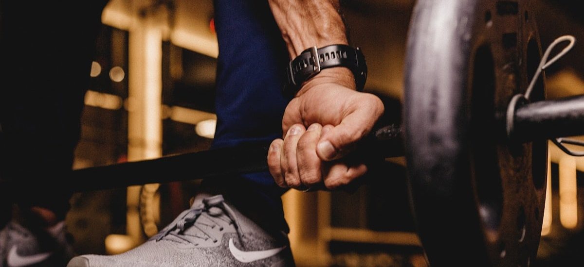 person about to lift barbell